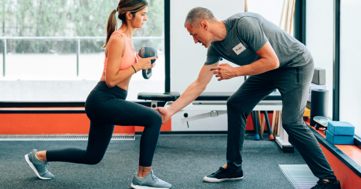 Fitness assessment notes on a clipboard