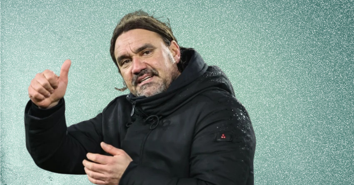 Football manager watching from the touchline